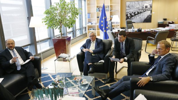 European Parliament president Martin Schultz, Mr Juncker and (far right) European Council president Donald Tusk meet in Brussels on the morning after the Brexit vote.