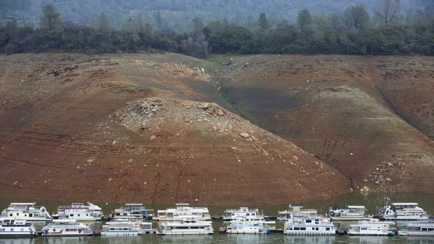 Sinking houseboats on Lake Oroville.