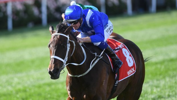 Hugh Bowman rides Winx to victory in the Cox Plate at Moonee Valley on Saturday.