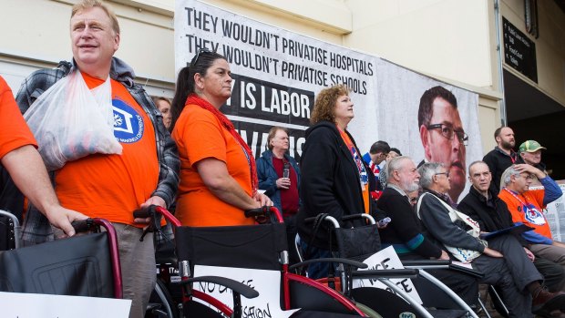 People protesting the privatisation of the NDIS in Melbourne in May.
