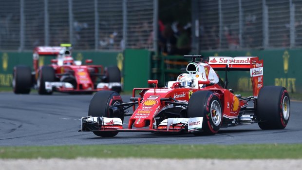 Ferrari driver Sebastian Vettel of Germany leads teammate Kimi Raikkonen in Melbourne.