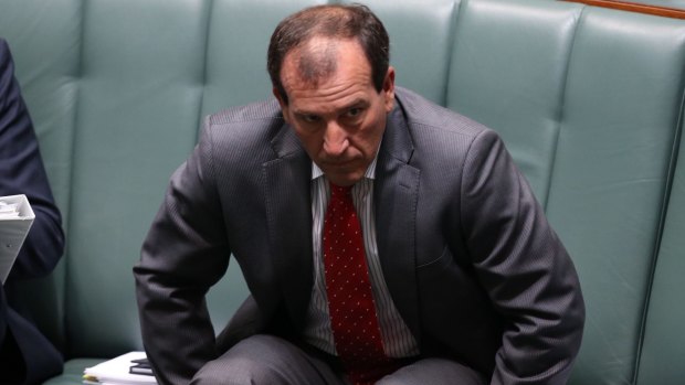 Mal Brough rises from his seat during question time to again take the walk to the despatch box.