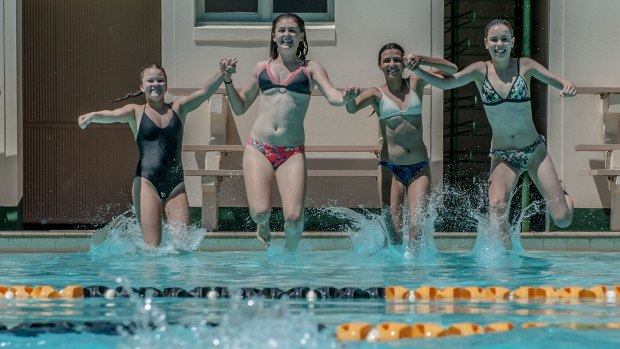 Georgia Austin, Claire Egan, Elizabeth de Souza and Alexandra Shield cool off at the Manuka Pool on Friday.