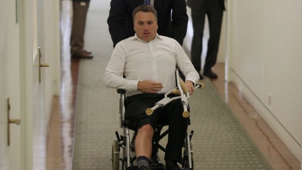 Take a knee: From January 1 injuries to MPs may be eligible for compensation if a parliamentary scheme passes. Former cities minister Jamie Briggs, who sustained his injury after a friendly tackle on Tony Abbott last year won't qualify.