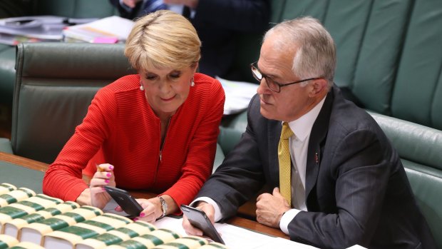 Prime Minister Malcolm Turnbull and Foreign Affairs Minister Julie Bishop  keep abreast of the US election results during question time on Wednesday.