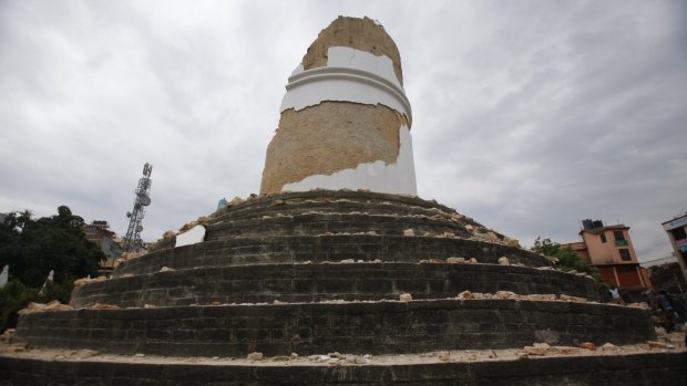 The historic Dharahara tower, a city landmark, stands destroyed after an earthquake in Kathmandu.