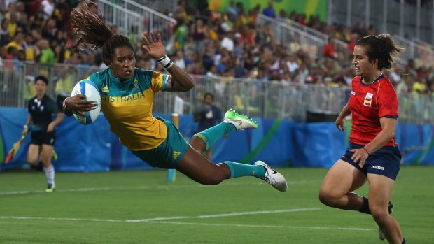 Flying high: Ellia Green crosses for a try against Spain at the Rio Olympics.