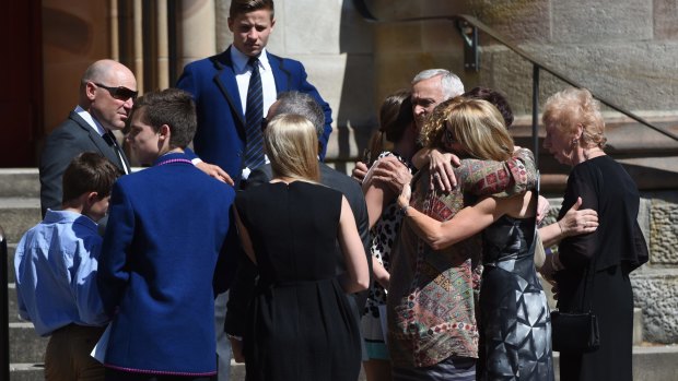 Never forgotten: Mourners outside St Marys.