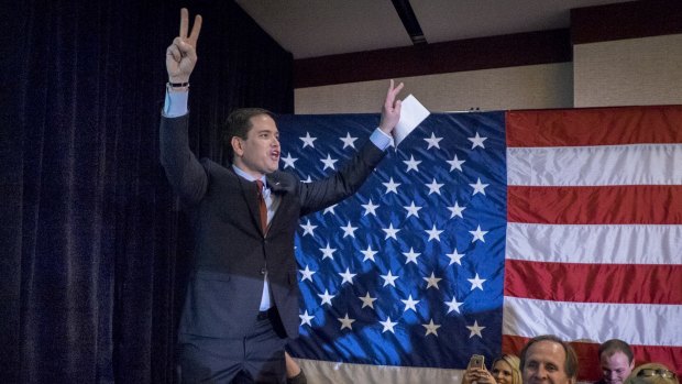Marco Rubio acknowledges the crowd after addressing supporters at a caucus night party in Des Moines, Iowa, on Monday.