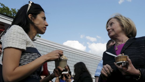 Democratic presidential candidate Hillary Clinton and aide Huma Abedin (left) in New Hampshire.