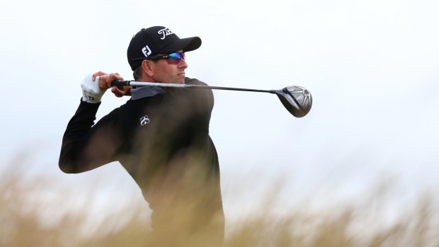 I'm your man, Scotty: Adam Scott tees off at the 6th during the first round the British Open.