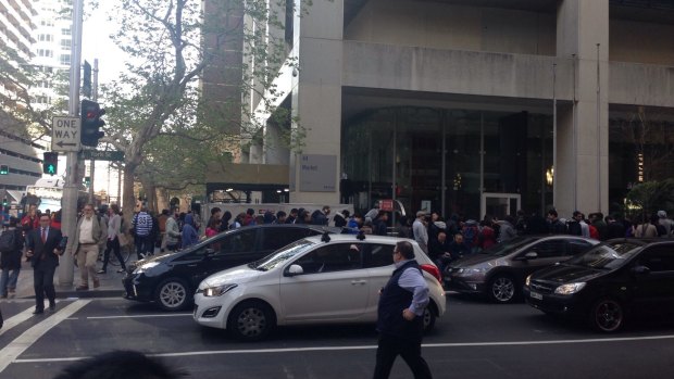 Apple customers on York Street, Sydney at 7.50am.