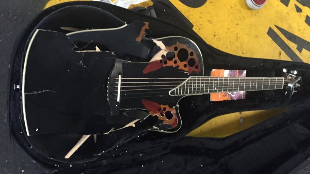 In pieces: Jon English's guitar.