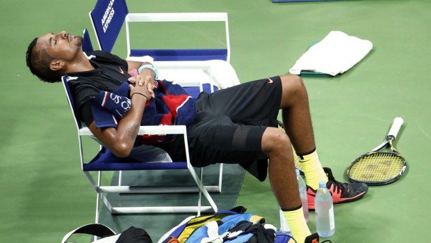 Seeking clarity: Nick Kyrgios takes a break between sets at the US Open..
