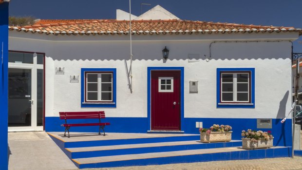 A house in the colours of the coast at Porto Covo.