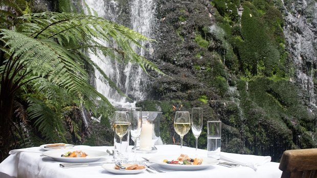 Dining under the waterfall.