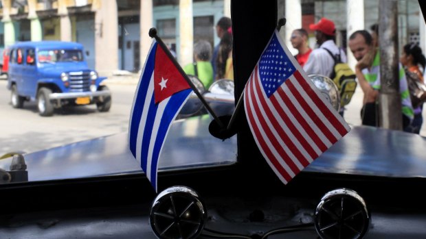 US President Barack Obama made good on a commitment to begin loosening economic sanctions against Cuba.