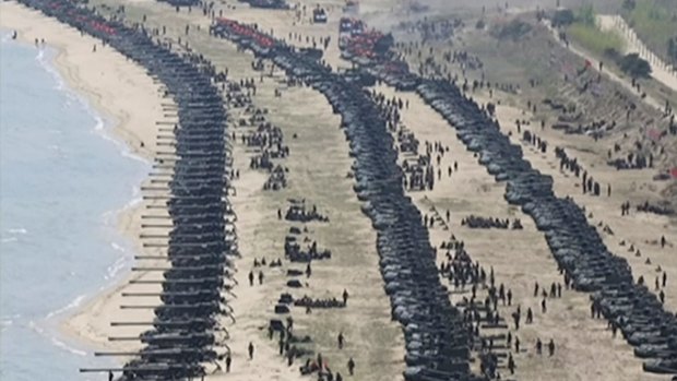 Tanks mass on a beach in North Korea as part of the live-fire drills.