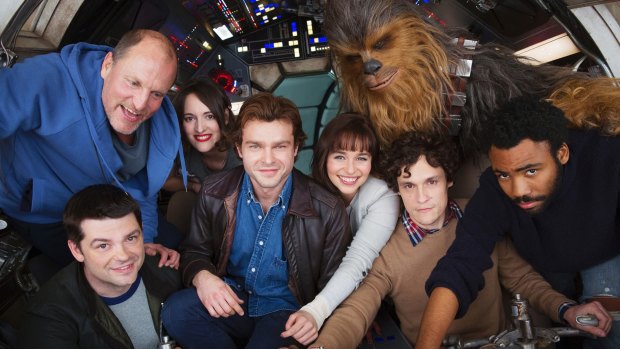 The cast members and former co-directors of the Han Solo Star Wars spin-off (from bottom left), Christopher Miller, Woody Harrelson, Phoebe Waller-Bridge, Alden Ehrenreich, Emilia Clarke, Joonas Suotamo as Chewbacca, Phil Lord and Donald Glover. 