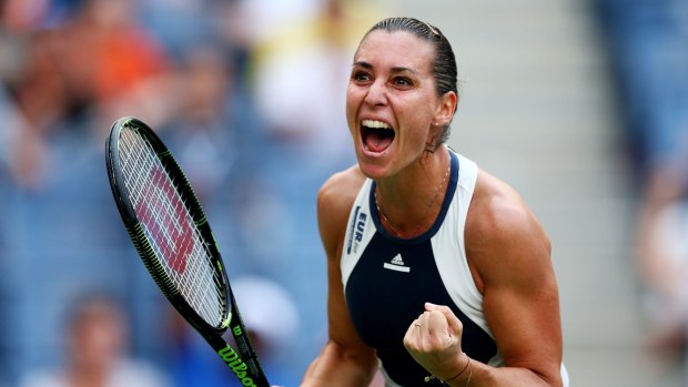 Flavia Pennetta celebrates her victory over Stosur.