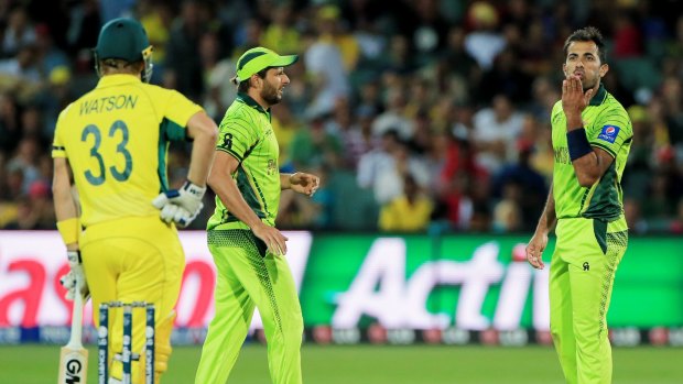 No love lost: Pakistan's Wahab Riaz blows a kiss to Australia's Shane Watson.