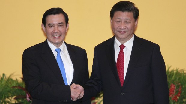 Historic meeting: Taiwan's President Ma Ying-jeou (left) and China's President Xi Jinping shake hands.