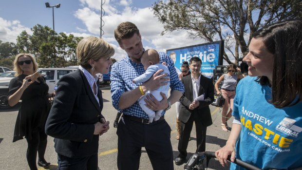 Andrew Hastie with his son Jonathon, wife Ruth and Deputy Prime Minister Julie Bishop at the Serpentine Jarrahdale Recreation Centre polling place.
