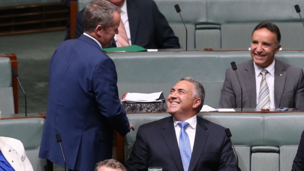 Opposition Leader Bill Shorten approaches Mr Hockey before his speech.