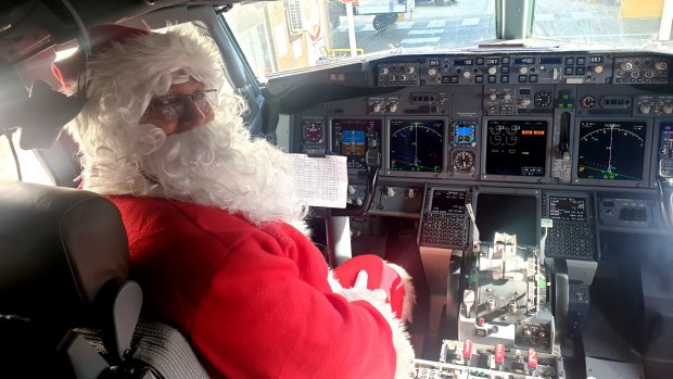 Don't be surprised to see Father Christmas around the Virgin Australia check-in desks (though probably not in the cockpit).