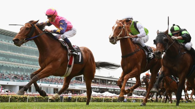 Chad Schofield hits the front on De Little Engine on Melbourne Cup day last year.