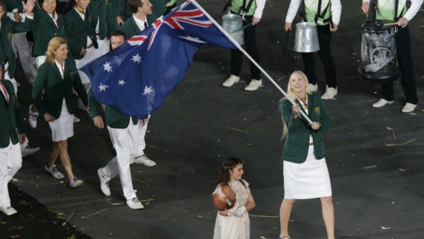Lauren Jackson carrying the flag for the Australian team at the London Olympics in 2012. She will be at the Rio Olympics in an off-court role.