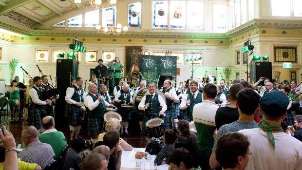 The Queensland Irish Association Pipe Band perform at the Irish Club in 2013.