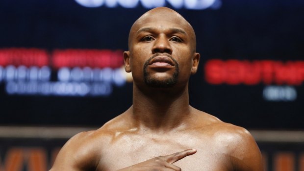 Floyd Mayweather jnr poses during his weigh-in in Las Vegas on Friday. 