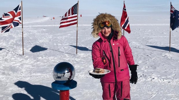Teenage adventurer Jade Hameister at the South Pole with the sandwich she made to respond to her online trolls.