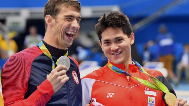 Medal tally: Phelps with Schooling after the 100 metres butterfly final.