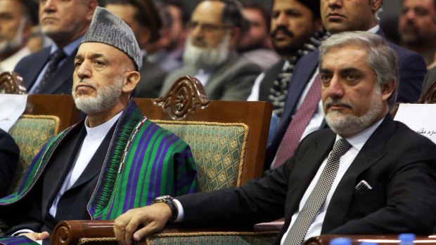 Uneasy peace: Afghan presidential candidate Abdullah Abdullah (right) had accused the incumbent, Hamid Karzai (left) of involvement in vote fraud.