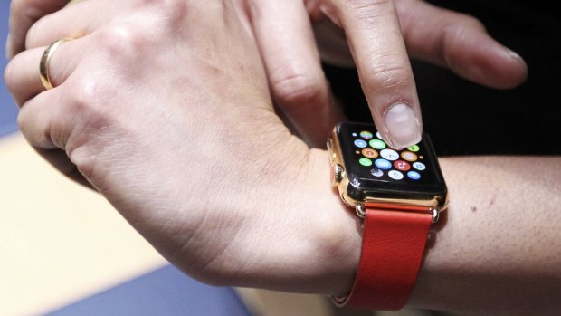 An attendee tries out an Apple Watch folowing the event.
