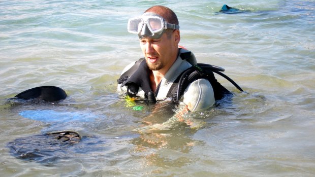 Bryan Fry with stingrays, which unlike fang blennys have a painful defensive venom. 

