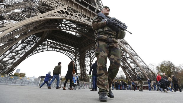 French military patrol near the Eiffel Tower the day after a series of deadly attacks in Paris.
