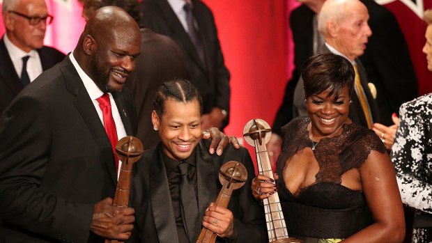 Hall of fame: Shaquille O'Neal, Allen Iverson, and Sheryl Swoopes with their awards.