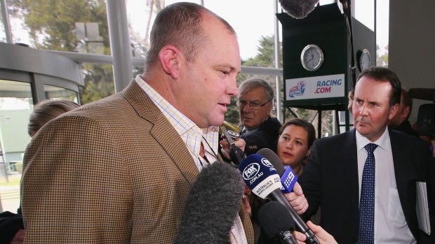 Waiting for an outcome: Trainer Peter Moody speaks to the media after his hearing.