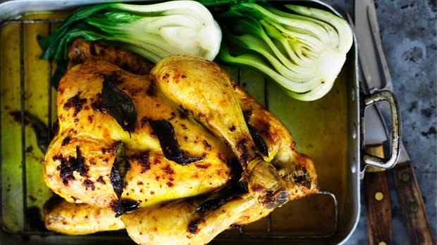 Salt-roasted chicken with turmeric and ginger.