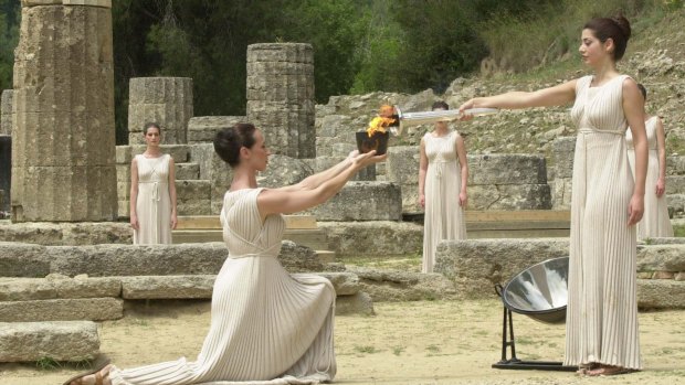 The ancient traditions were brought back to life at the opening ceremony of the Athens Olympics in 2000. The torch was lit at Olympia's temple of Hera, on the site where the original Olympics were born in 776 BC.