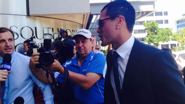 DAY IN COURT: Media greets Karmichael Hunt as he arrives at Southport Magistrates Court.