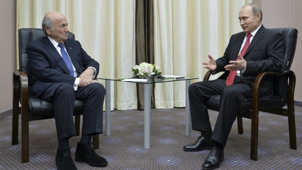Russian President Vladimir Putin (right) meets with FIFA president Sepp Blatter in Sochi.