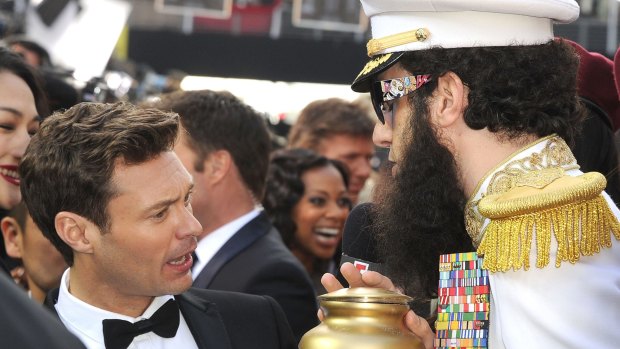 Baron Cohen famously tipped a gold urn containing "the ashes of Kim Jong-iI" over the furious pint-sized presenter's Burberry suit at the 2012 Oscars.