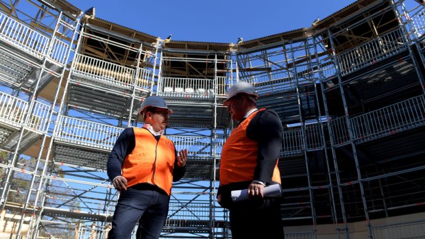 Lord mayor Robert Doyle and Pop-up Globe Founder Dr Miles Gregory (left) tour the new theatre construction project, the Pop-up Globe, in Melbourne.