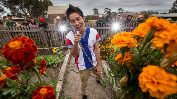 Hsa Hae, or "Star Boy", volunteers at the Werribee Mansion Community Gardens to learn English and gain life skills. 
