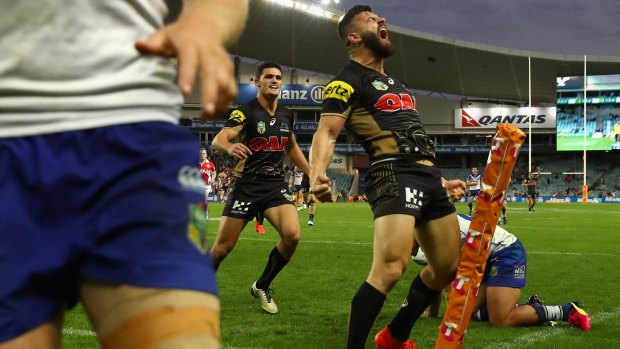 You beauty: Josh Mansour celebrates his try against the Bulldogs. 