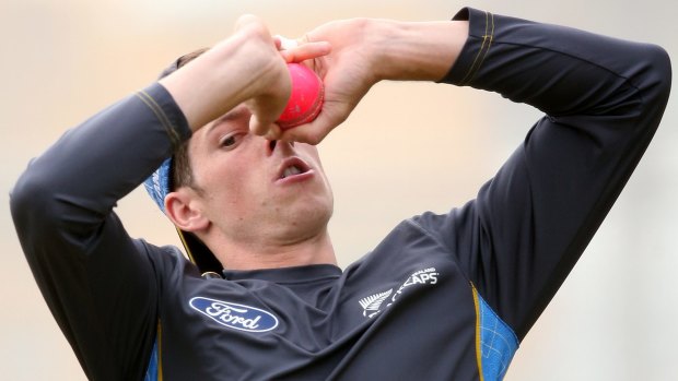 New Zealand's Mitchell McClenaghan bowls with the pink ball in the nets at Adelaide Oval.